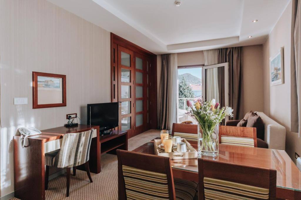 Apartment interior with dining table and balcony